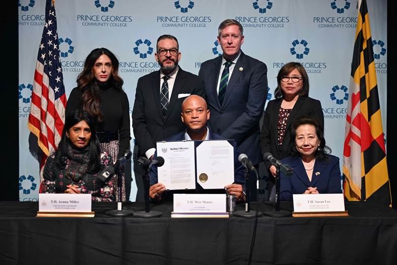 Governor Moore, Lt. Governor Miller, Maryland Department of  Labor Secretary Portia Wu and others.