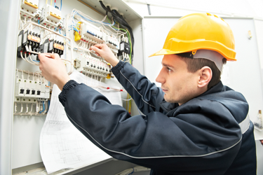 man in yellow hard hat at work